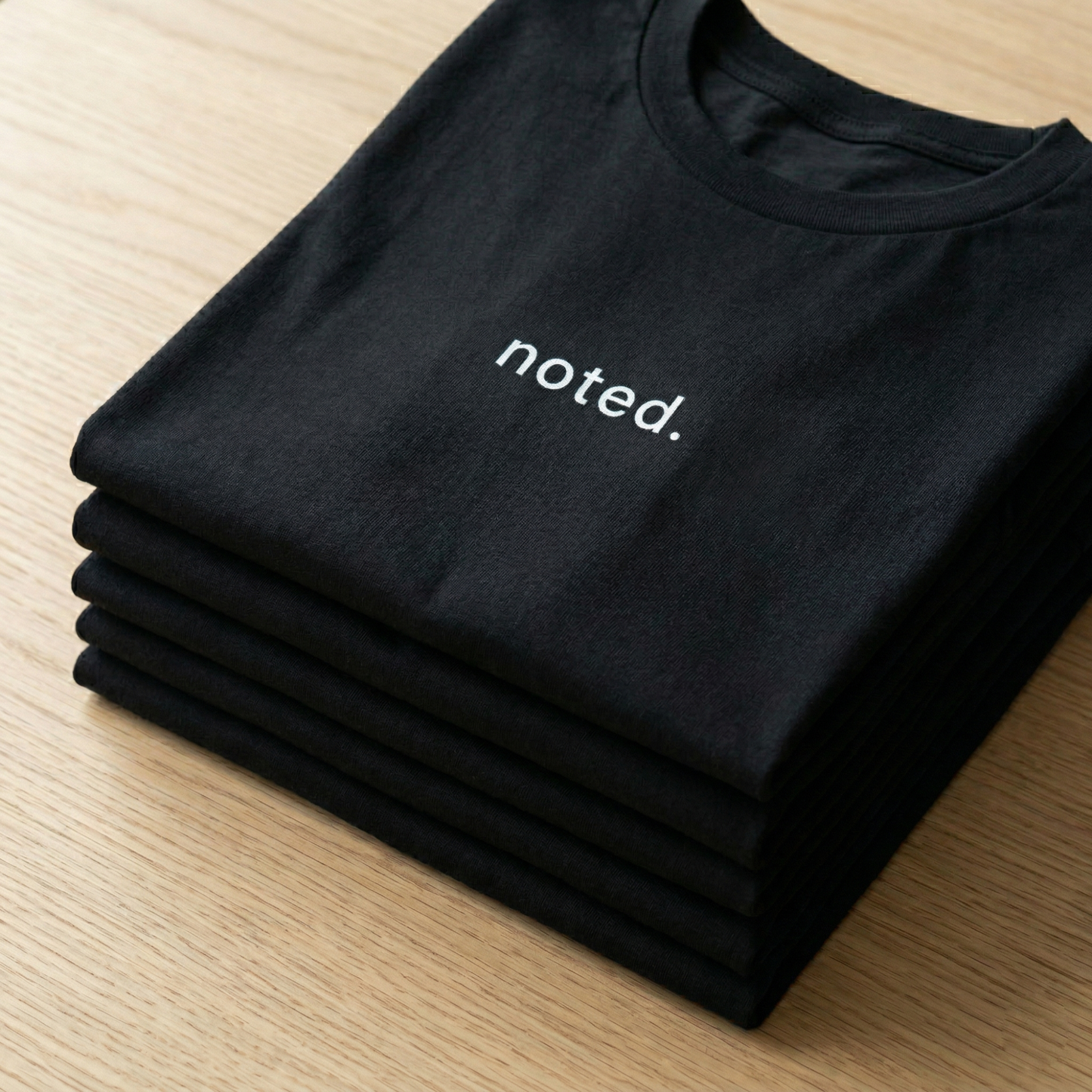 Noted. Tee – Minimal Corporate Humour T-Shirt
